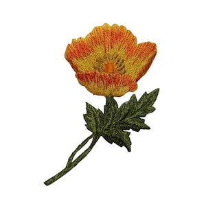 May include: A yellow and orange embroidered flower with green leaves and a stem.