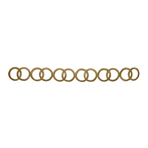 May include: A gold chain made of interlocking circles. The chain is made of a shiny, metallic material.