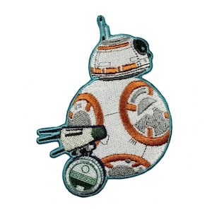 May include: An embroidered patch of BB-8, a droid from the Star Wars franchise. The patch is white, orange, and gray with a blue outline. BB-8 has a round body with a dome-shaped head and a small, round, green and white cannon on the side.