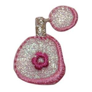 May include: A pink and white glitter iron-on patch shaped like a perfume bottle with a pink flower design.