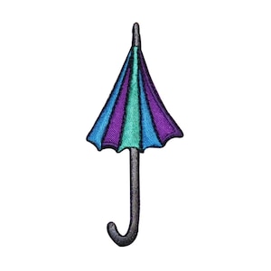 May include: A purple, blue, and green striped umbrella with a black handle.