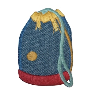 May include: A blue denim pouch with a yellow embroidered design and a red trim. The pouch has a blue drawstring.