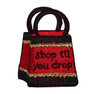 May include: Red and black fabric shopping bag with gold trim and the text "shop til you drop" embroidered on the front.