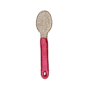May include: A small embroidered patch of a spoon with a beige bowl and a pink handle.