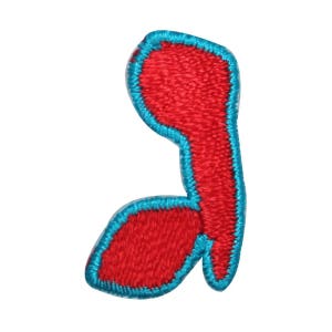 May include: A red felt letter 'J' with a blue outline. The letter is embroidered and has a fuzzy texture.