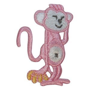 May include: Pink embroidered monkey applique with a white face and a yellow and pink foot.