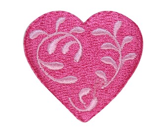 May include: Pink felt heart-shaped patch with a white embroidered floral design.