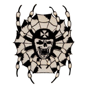 May include: Black and white embroidered patch of a skull with a cross on its head, surrounded by a spider web and eight spider legs.