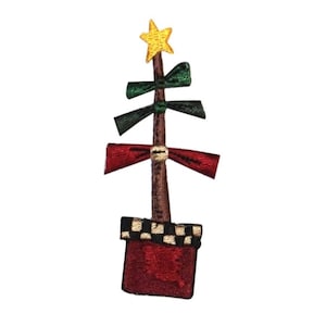 May include: A red and green Christmas tree with a yellow star on top, in a red pot with a black and white checkered trim.