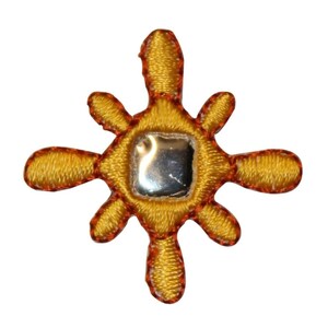 May include: A yellow embroidered sun with a silver reflective center. The sun has eight points and is outlined in orange.