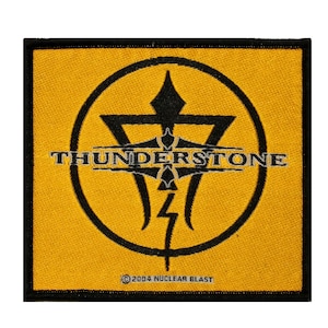 May include: A yellow square patch with a black circle containing a stylized lightning bolt and the text "THUNDERSTONE" in black. The text "©2004 NUCLEAR BLAST" is in the bottom center of the patch.
