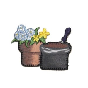 May include: Embroidered patch depicting two potted plants. One pot contains blue and yellow flowers, the other is empty. The patch is in shades of brown and grey.