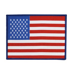May include: Rectangular patch featuring the American flag. The flag has a blue field with white stars in the upper left corner and red and white stripes. The patch is bordered with a blue trim.