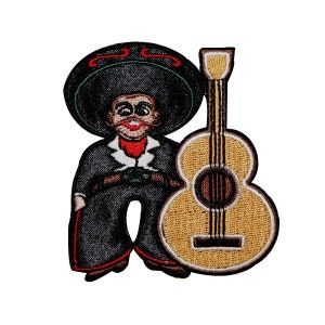 May include: Embroidered patch of a cartoon mariachi musician wearing a black suit, red bow tie, and a large sombrero. The musician is holding a brown acoustic guitar.