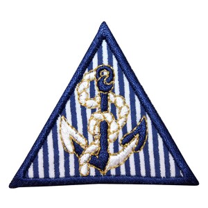 May include: A blue and white striped triangle patch with a gold and white embroidered anchor.
