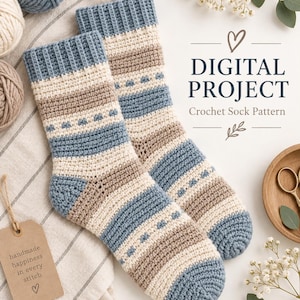 May include: A pair of crochet socks featuring horizontal stripes in blue, beige, and cream with a ribbed cuff. The text reads: DIGITAL PROJECT Crochet Sock Pattern. A brown tag displays the text: handmade happiness in every stitch.