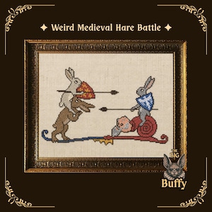 May include: A cross-stitch embroidery titled Weird Medieval Hare Battle, framed in an ornate gold frame. The design features two hares in combat, one riding a brown creature and the other riding a red snail, both holding spears and shields.