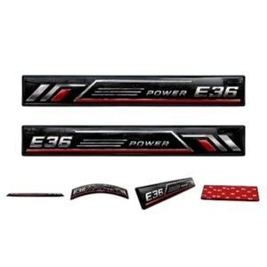 May include: Two rectangular black emblems featuring the silver text E36 and POWER with red and silver accent stripes. Below are four smaller variations of the emblem, including curved and angled versions, and one rectangular piece with a red adhesive backing.