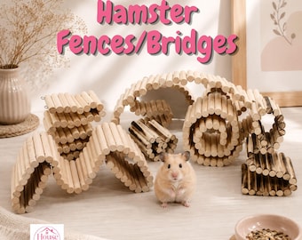 May include: A collection of flexible wooden stick bridges and fences for small pets, arranged in various curved shapes. A small hamster stands in the center. The text "Hamster Fences/Bridges" is displayed in pink letters at the top of the image.
