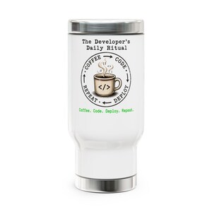 May include: A white travel mug with a silver lid and base. The mug features a circular design with a coffee cup, code brackets, and the words "Coffee, Code, Deploy, Repeat." The text "The Developer's Daily Ritual" is printed above the design.