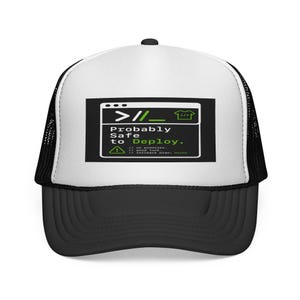 May include: A black and white trucker hat with a curved peak. The hat has a rectangular patch with the text "Probably Safe to Deploy" in white and green, alongside a command prompt symbol and a t-shirt icon.