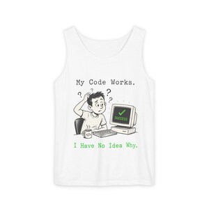 May include: White vest top with a humorous graphic. The design features a cartoon of a person scratching their head in confusion, with a computer screen displaying "SUCCESS." Text reads "My Code Works. I Have No Idea Why."