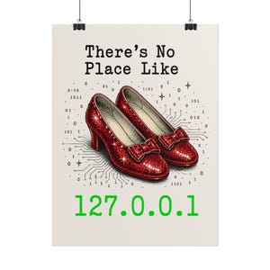 May include: A poster featuring a pair of red glittery pumps with bows, surrounded by binary code and circuit board lines. The text reads "There's No Place Like" in black and "127.0.0.1" in green, set against a light cream-colored background.