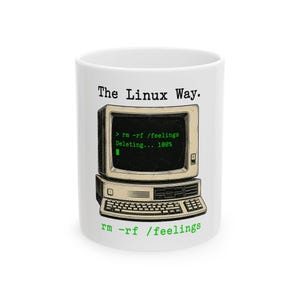 May include: A white ceramic mug featuring a vintage computer illustration with the text The Linux Way. The screen displays the command rm -rf /feelings and Deleting... 100%. The text rm -rf /feelings is printed in green at the bottom.