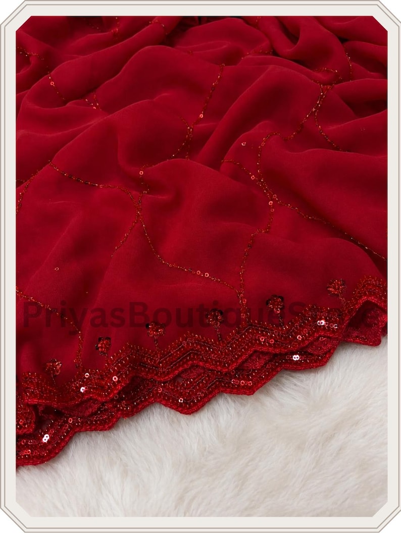 May include: A deep red fabric featuring a delicate, flowing drape with a scalloped edge. The material is adorned with intricate, thin lines of matching red sequins arranged in a diamond pattern, with additional sequin detailing along the border.