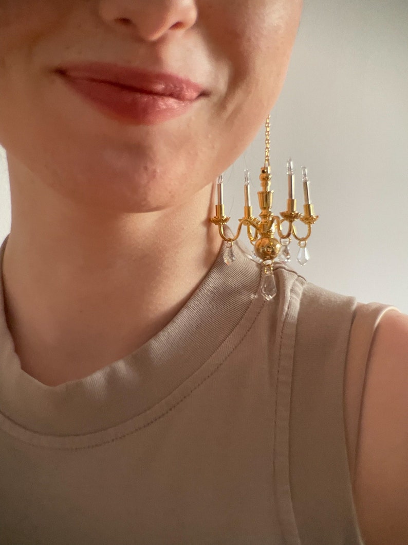 chandelier statement earrings in gold non-lighting image 1