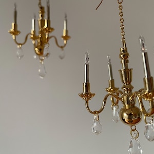 chandelier statement earrings in gold non-lighting image 9