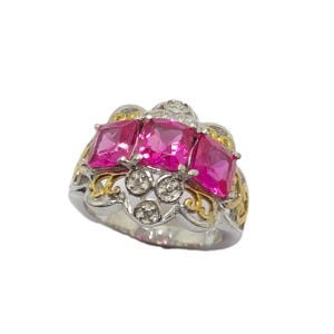 Simulated Pink Topaz Three-Stone Ring with Cushion Cut Decorative Two-Tone Band