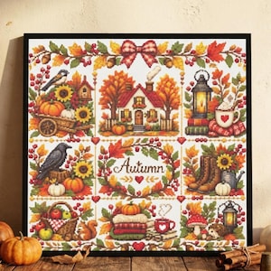 May include: A framed cross-stitch embroidery featuring a grid of nine autumn-themed panels. The design includes pumpkins, sunflowers, a house, a lantern, a crow, a squirrel, boots, and the word Autumn in the centre, all in warm seasonal colours.