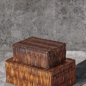 May include: Two rectangular storage boxes stacked on top of each other, crafted from dark brown wood with a distinct vertical, textured, and ribbed pattern across the exterior surfaces, featuring a lid on the top box and a base box below.