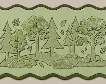 May include: A rectangular sage green rug with a scalloped edge and a dark olive green border. The surface features a tufted, raised forest scene with various trees, bushes, and scattered leaves in a monochromatic light green color palette.