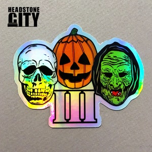 Halloween III Season of the Witch Holographic Sticker | Silver Shamrock Masks Decal