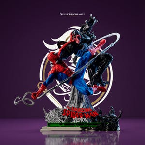 May include: A detailed collectible statue featuring Spider-Man in a red and blue suit fighting the black-suited Venom. The base displays the text The Amazing Spider-Man Venom and SculptAlchemist. The figures are posed in a dynamic action scene.