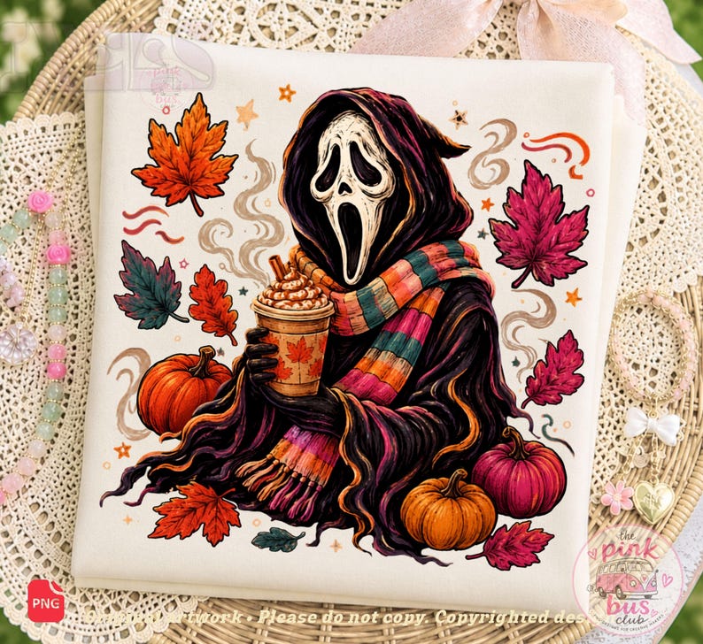 May include: A white fabric square featuring a graphic illustration of a ghost figure in a black hooded robe and a colorful striped scarf, holding a coffee cup. The design includes orange pumpkins, red and orange autumn leaves, and small stars.
