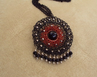 Fire Eye. Crochet Jewelry. Beaded Pendant. Black and Red. Custom Jewelry. Lace Jewelry.