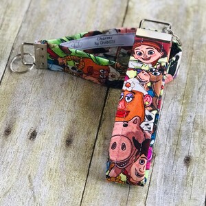Disney&#39;s Toy Story Stacked Key Fob Wristlet