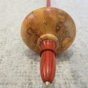 Lightweight Bowl style Supported Spindle in Red Timoho Burr