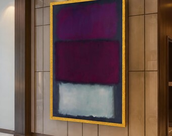 May include: A large rectangular abstract painting featuring three horizontal color blocks in deep purple, dark maroon, and light gray, enclosed within a textured gold frame. The artwork displays soft, blended edges between the distinct color sections.