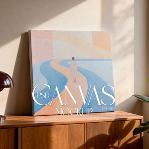 May include: A canvas art print featuring an abstract landscape with a figure walking on a path. The artwork is in pastel colors and is displayed on a wooden cabinet. The words "PSD CANVAS MOCKUP" are printed on the canvas.