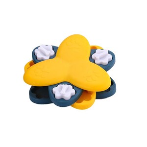 May include: A bright, multi-layered toy featuring a yellow propeller-like top and blue and yellow petal-shaped components. White, flower-shaped pieces are set into the blue petals. The toy is designed for children.