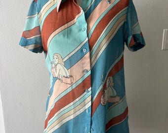 vintage short-sleeve button-front blouse featuring an Art Deco design