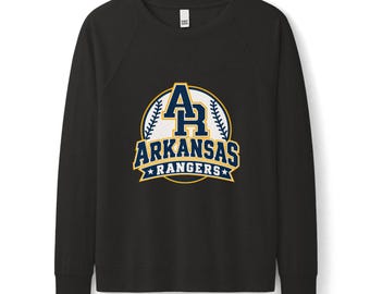 May include: A black long-sleeve sweatshirt featuring a graphic on the chest. The design includes a white baseball shape with navy blue and yellow text that reads AR ARKANSAS RANGERS, accented by two small stars on the bottom banner.