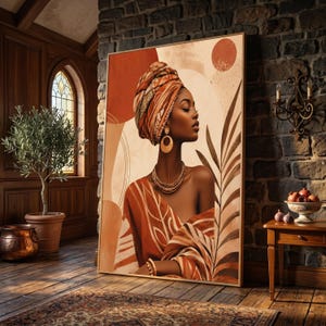 May include: A rectangular wall art print featuring a portrait of a person with dark skin wearing a patterned headwrap, large gold hoop earrings, and a layered necklace. The artwork uses a warm colour palette of terracotta, cream, and brown tones.