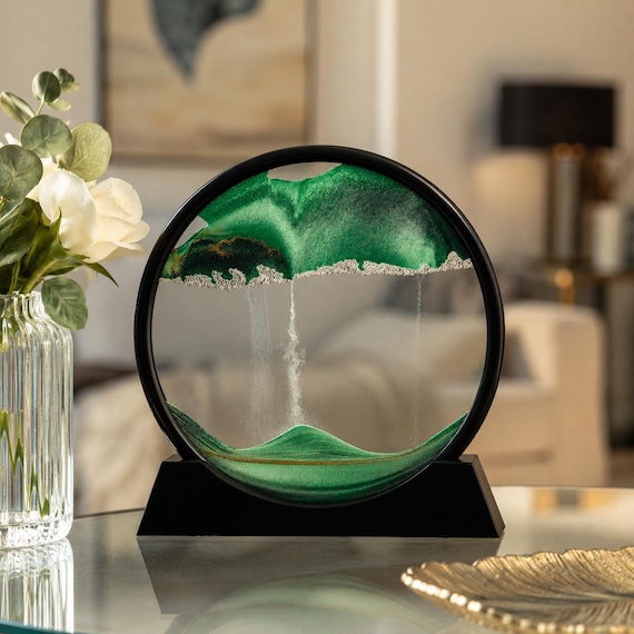 Flip it and watch a slow-motion deep-sea world drift and layer inside a sealed glass frame — meditative desk art that never gets old.