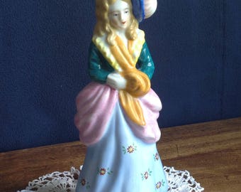 Made in occupied Japan colonial lady figurine.