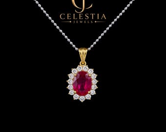 May include: A gold pendant necklace featuring an oval-cut deep red gemstone surrounded by a halo of small clear stones on a silver-toned ball chain. The logo for Celestia Jewels is visible above the pendant against a solid black background.